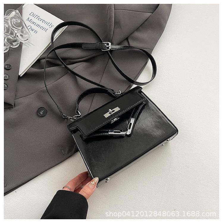 

В этом году популярная маленькая сумка для переноски в руке женская 2025 новая модная простая сумка-мессенджер повседневная универсальная сумка для поездок на работу Kelly