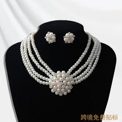 Nouvel Ensemble de Bijoux Collier Boucles d'Oreilles Clous Fleur de Bonheur Perle Accessoires de Mariage