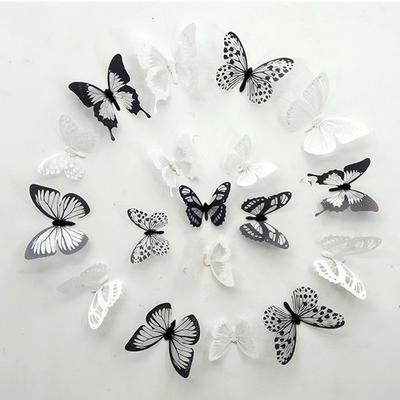 Um conjunto de 18 borboletas 3d pretas e brancas para embelezamento do lar no quarto e sala de estar e decoração de parede de fundo