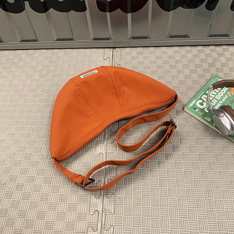 

Versatile Dumpling Bag Female Personality Solid Color Messenger Bag Trendy Brand Commuter Shoulder Bag Light Mobile Phone Bag Male помаранчевий