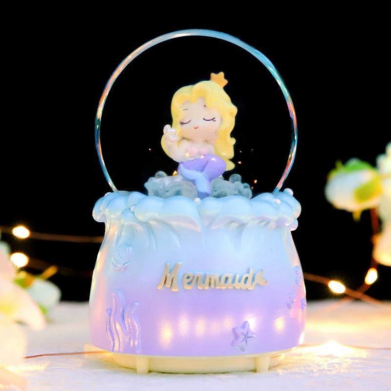 Adorno de Bola de Cristal Musical de Astronauta Nevado