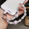 Pearl crystal mobile phone lanyard, short sparkling diamond bead bracelet, women's wrist anti lost hanging accessory