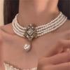 Diamond-encrusted Pearl Multi-layer Water Drop Pendant Necklace French Retro High-end Elegant Collarbone Chain Niche Fashion Jewelry