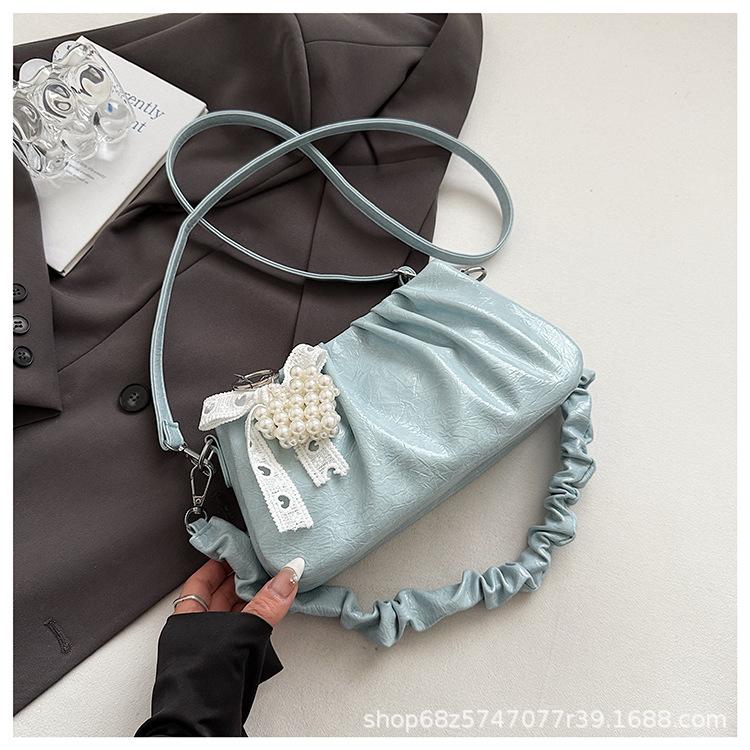 Niche design bag women's 2025 new casual Korean version messenger bag fashion shoulder pleated cloud bag