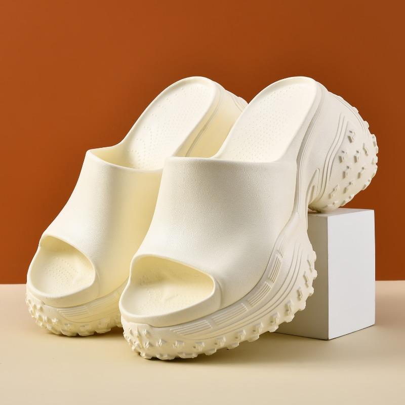 Super thick-soled outer wear eva slippers for women's summer height increase, new fashionable non-slip and deodorant soft-soled one-word slippers