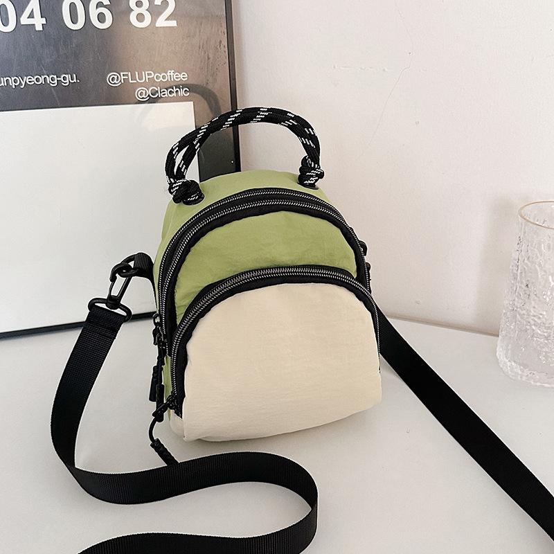 

Japanese niche shell bag women s 2025 new casual sports style backpack fashion casual shoulder messenger bag зелёный
