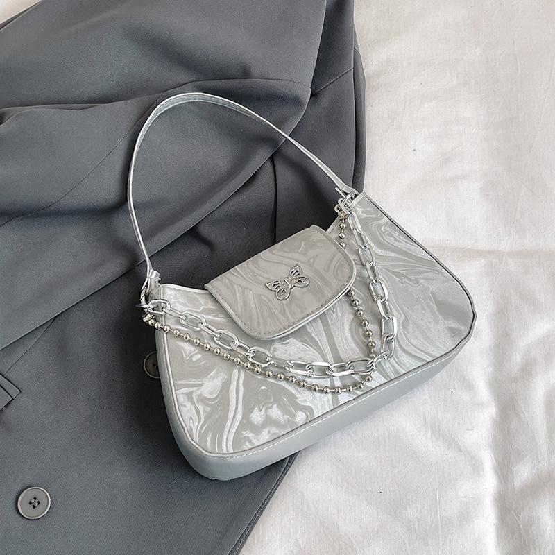 

Women s simple underarm bag 2025 summer new versatile ins shoulder bag popular Korean version of women s bags this year серебряный