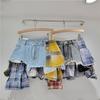 Partea inferioară (Îmbrăcăminte damă) – Pantaloni scurţi