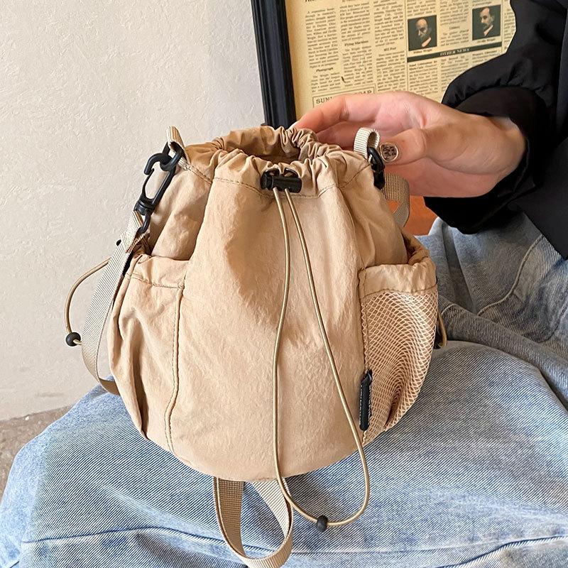 Trendy New Fashion Ins Casual Simple and Lightweight Drawstring Bucket Bag Commuting Versatile Sports Travel Messenger Bag