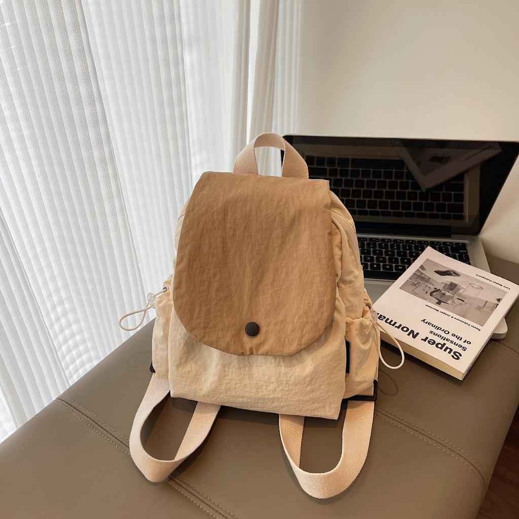 New Large Capacity Multi Functional Lightweight Simple and Fashionable Water Repellent Backpack for Men and Women.