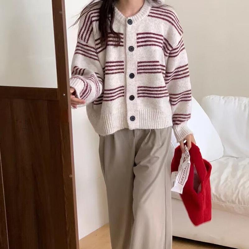 Autumn and winter new versatile striped contrasting color knitted cardigan top women's loose lazy wind outside sweater jacket