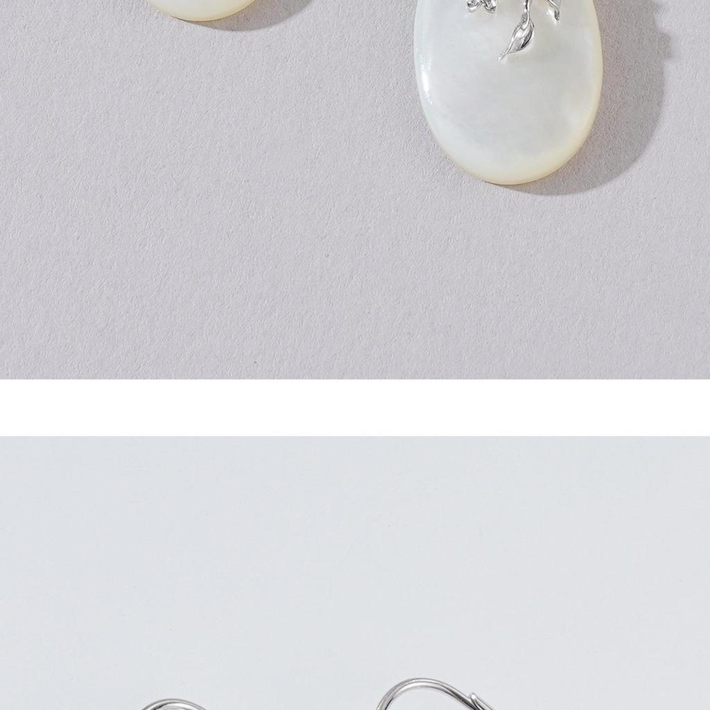 Exquisite Mother-of-Pearl Sterling Silver Luxury Earrings with Unique Face-Inspired Design