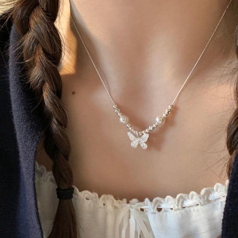 Imitation pearl broken silver bow necklace temperament light luxury high sense versatile lady natural pearl collarbone chain