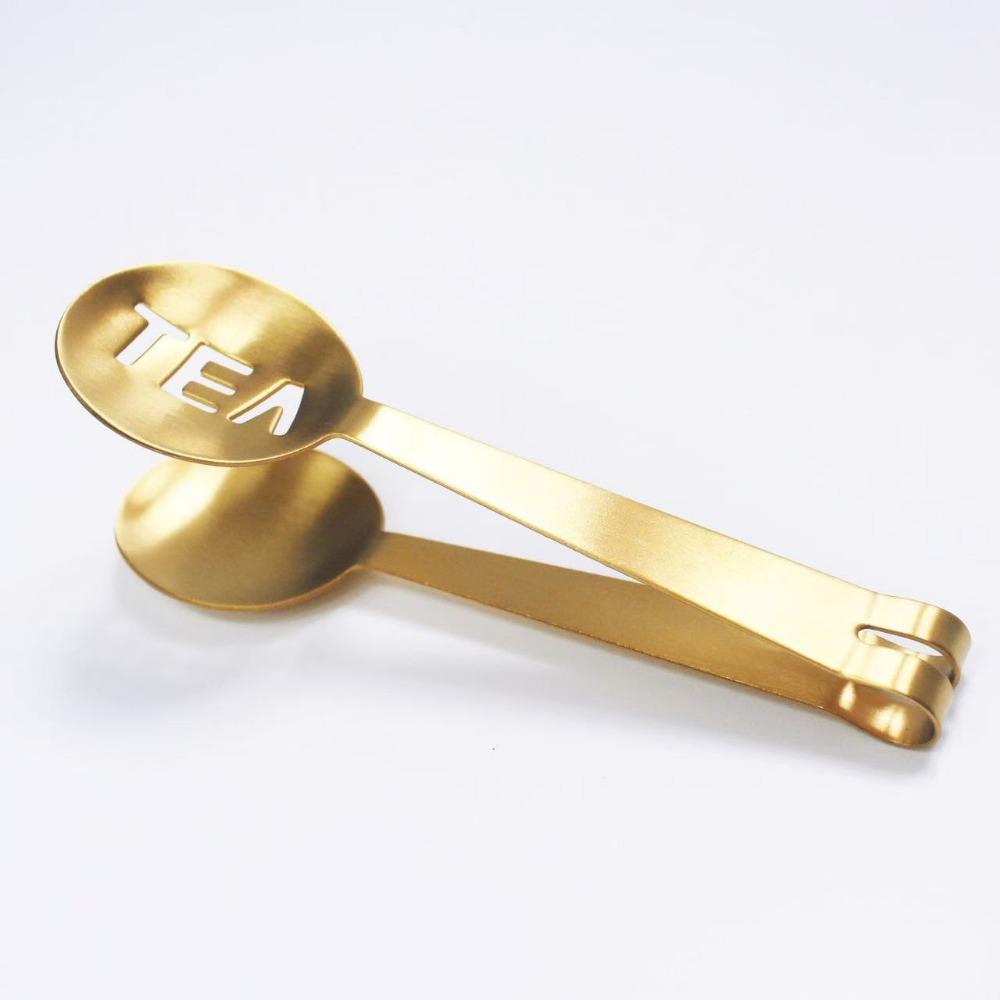 

1 шт. Соковыжималка для чайных пакетиков из нержавеющей стали, щипцы для чайных пакетиков, серебряный зажим для чайных пакетиков, ложка для чайных пакетиков для выпадения листьев, захват кубиков льда, сахара золотой