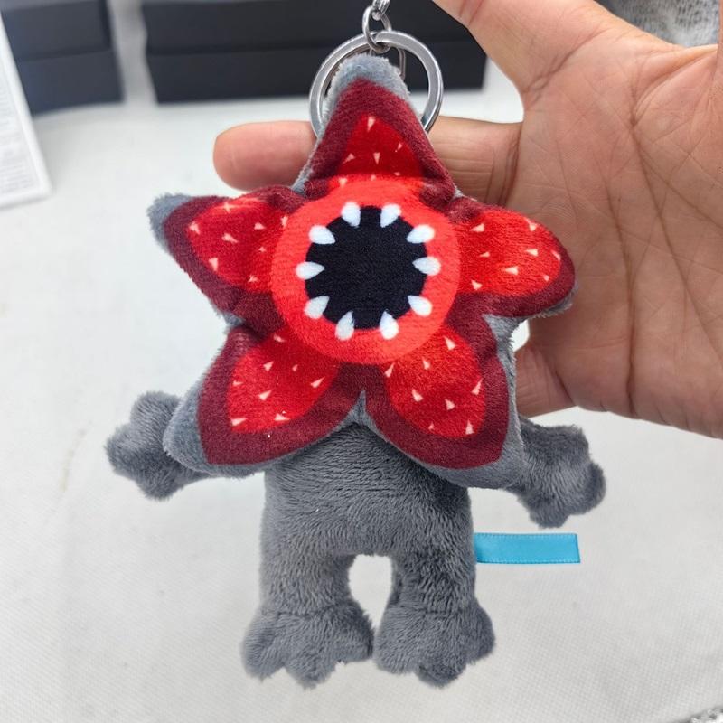 

Popular cartoon activity character plush keychain featuring a man-eating flower fit designed for both boys plus girls белый