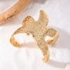 Multipurpose Gold Tone Starfish Bracelet for Trendy Women Offering Adjustable Fit and Sturdy Alloy Construction