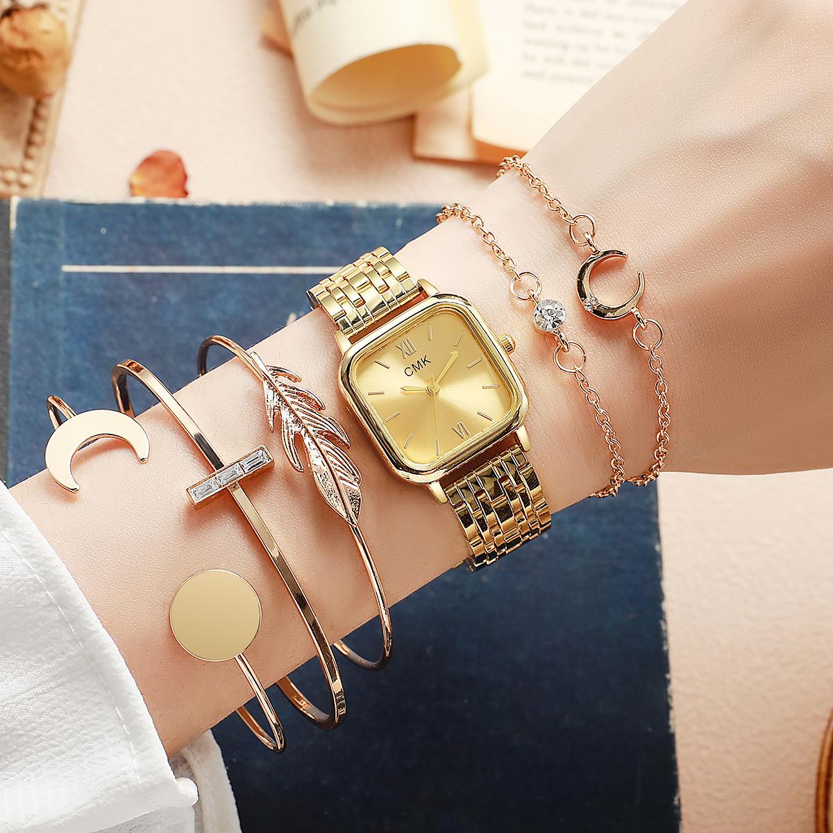 

Women s fashion versatile Korean version of the simple student steel strap quartz watch wrist feather bracelet золотой