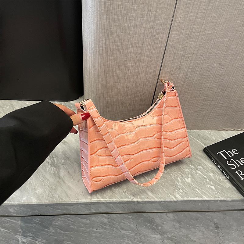 French niche bag women's 2026 new fashion solid color underarm bag texture portable shoulder baguette bag