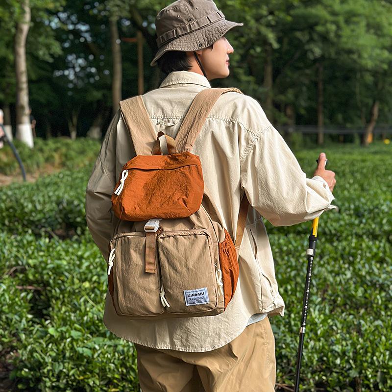 Outdoor japanische Farbkombination Rucksack große Kapazität Mehrfachtaschen Schultasche einfacher lässiger Rucksack Spritzwassergeschützt und verschleißfest