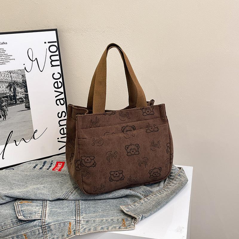 Neue Modehandtasche, schön, lässig, leichte und geräumige Handtasche, trendiger Cartoon-Druck, niedliche Aufbewahrungstasche