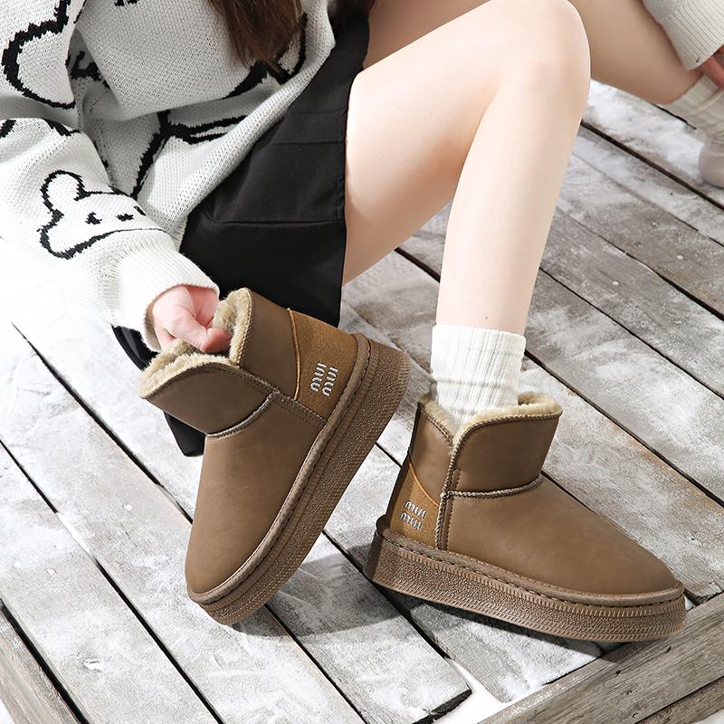 Chaussures pour femmes 2024 Marque Bottes mi-mollet pour femmes Mode Slip-on Bottes quotidiennes Femmes Vente chaude Bout rond Garder au chaud Bottes de neige unies