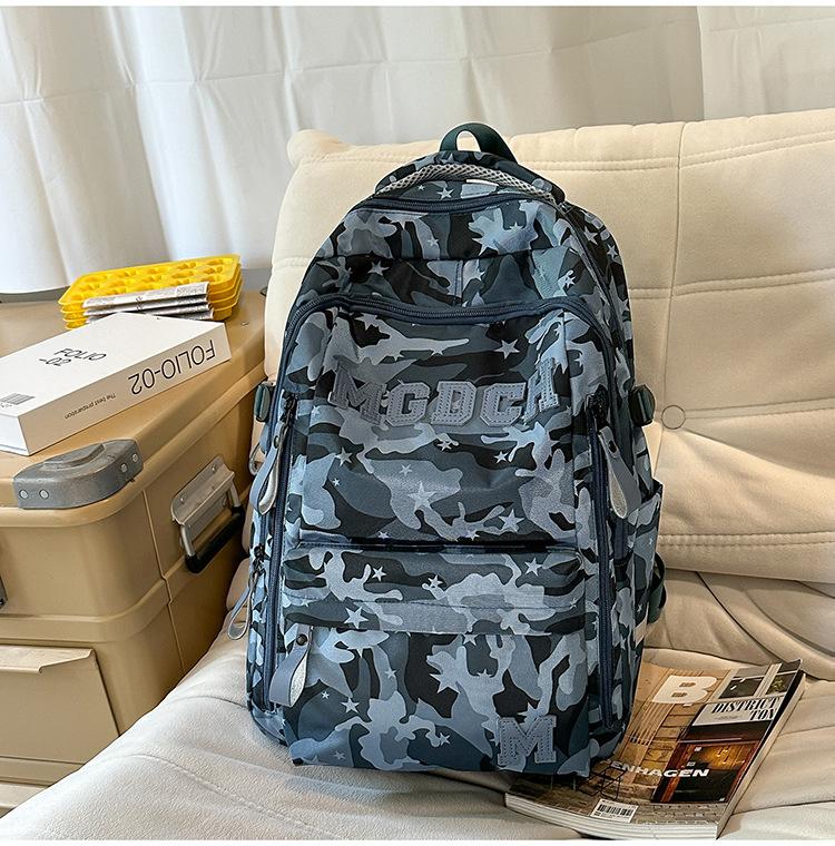 Schoolbag schoolbag female burden reduction large-capacity backpack male can hang tie rod college student travel commuter backpack tie-dye bag