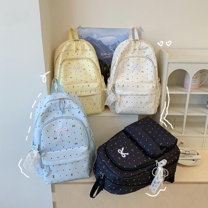 Schoolbag new Japanese high-value female junior high school students class schoolbag polka dot bow student versatile backpack