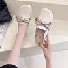 Baotou half slippers women's summer wear 2025 new flat-bottomed bow non-slip lazy Muller French cool slippers