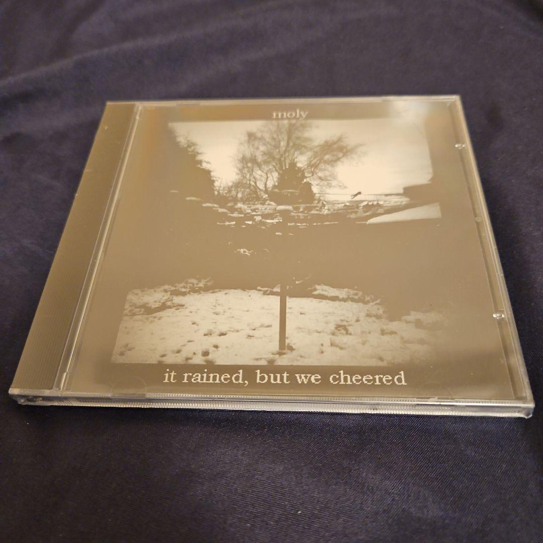 

[USED] moly. It Rained, But We Cheered