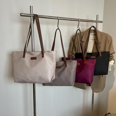 Pendler-Tasche mit großem Fassungsvermögen für Damen Neue lässige Handgepäck-Einkaufstasche Schultertasche College-Studenten-Klassen-Tragetasche