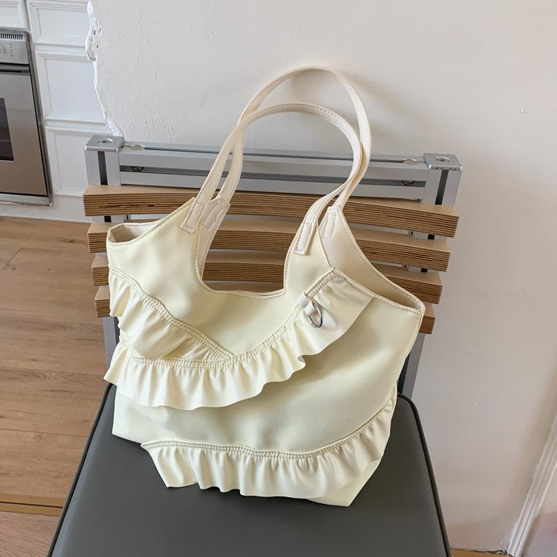 

2025 Spring and Summer New Forest Korean Version Literature and Art Student Document Handbag Large Capacity Ruffled One-Shoulder Canvas Bag