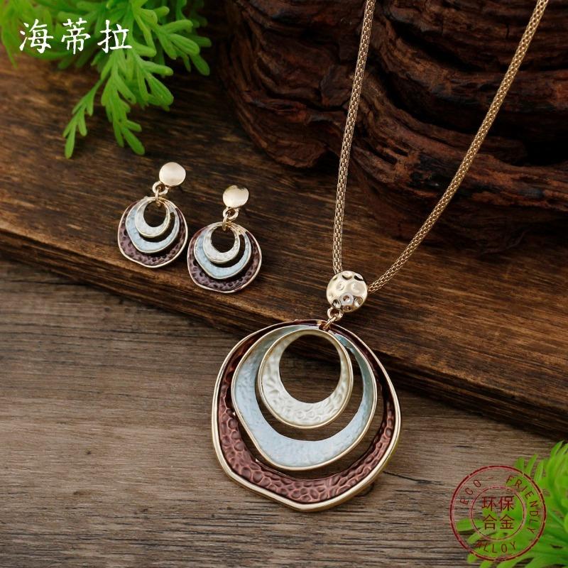 New enamel three-layer round ring stud earrings pendant set, women's simple and advanced sense hollow ring necklace