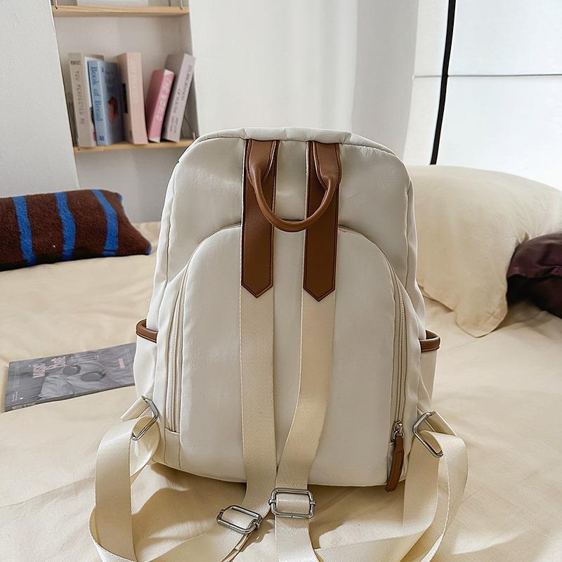 Fresh and sweet candy color backpack for junior high school students, solid color, simple and large-capacity backpack.