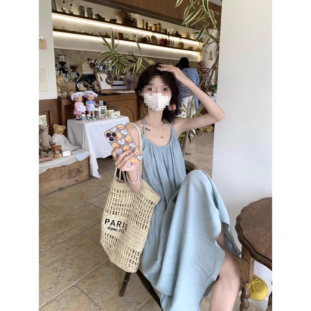 Seaside vacation style blue suspender dress women's spring new loose backless strap A-word long dress ins trend