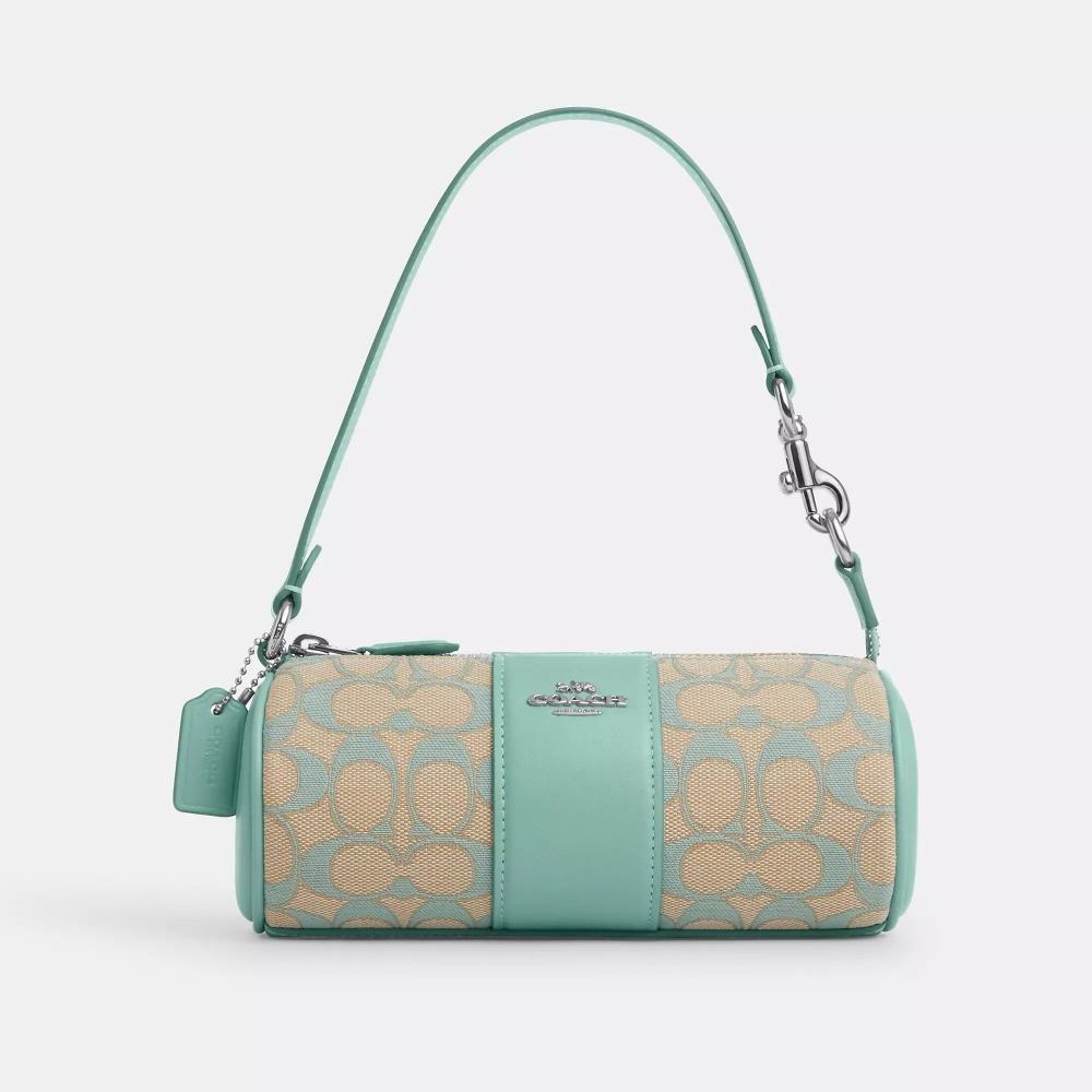 

Сумка Coach Nolita Barrel из фирменного жаккарда выцветшего синего цвета