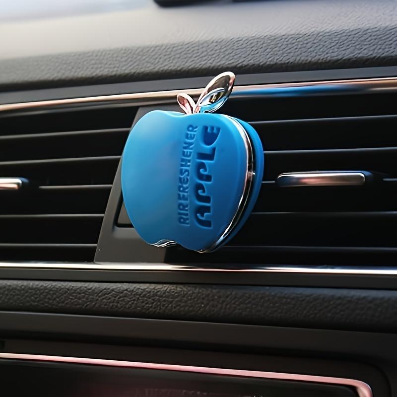 An apple-shaped car air freshener with floral fragrance - featuring a decorative ventilation clip design