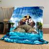 Characters stand on a rocky island surrounded by seals and ocean waves. for all seasons blanket lunch break throw gift