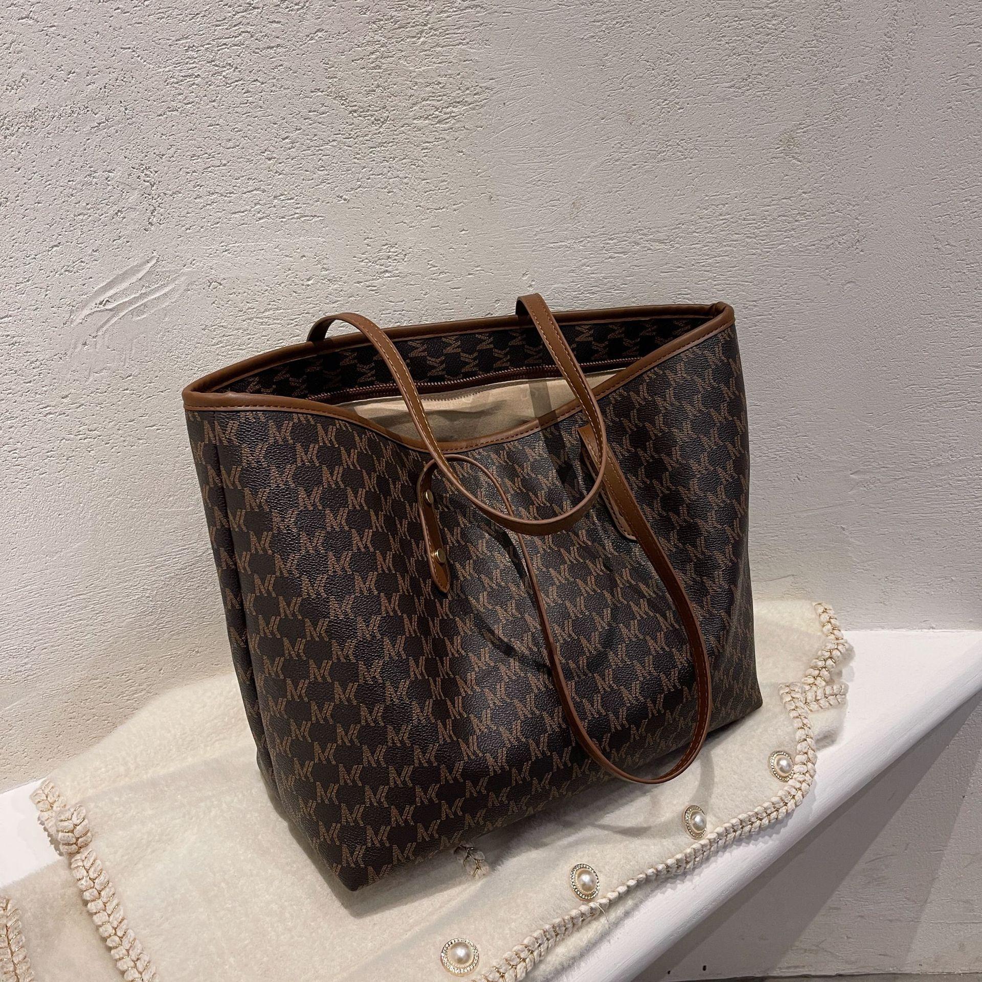 

Женская сумка премиум-класса большой вместимости, нишевая универсальная сумка-тоут для通勤, женская портативная сумка через плечо премиум-класса