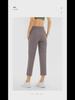 Women's Quick-Dry Yoga Pants: Breathable, Loose-Fit, Nine-Point Length with Drawstring for Running and Fitness.