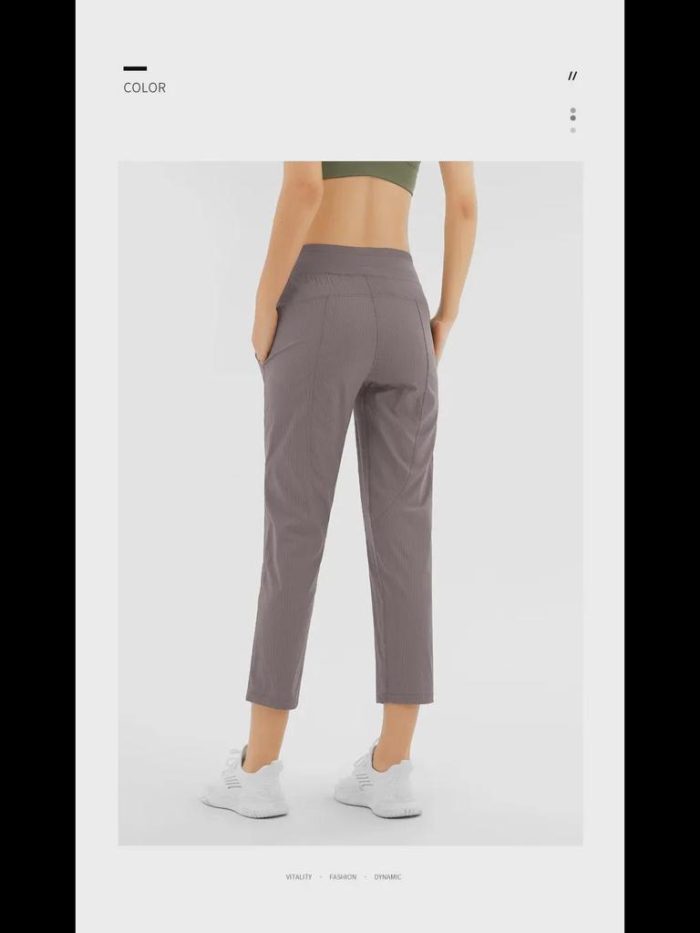 Women's Quick-Dry Yoga Pants: Breathable, Loose-Fit, Nine-Point Length with Drawstring for Running and Fitness.