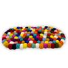 Tovaglietta ovale in feltro con palline, 38x18 cm, multicolore.