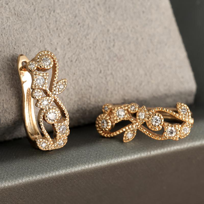 Elegante weiße Zirkon-Blatt-Tropfen-Ohrringe für Frauen Goldfarbe Hohle Creolen Modeschmuck Weihnachtsgeschenk