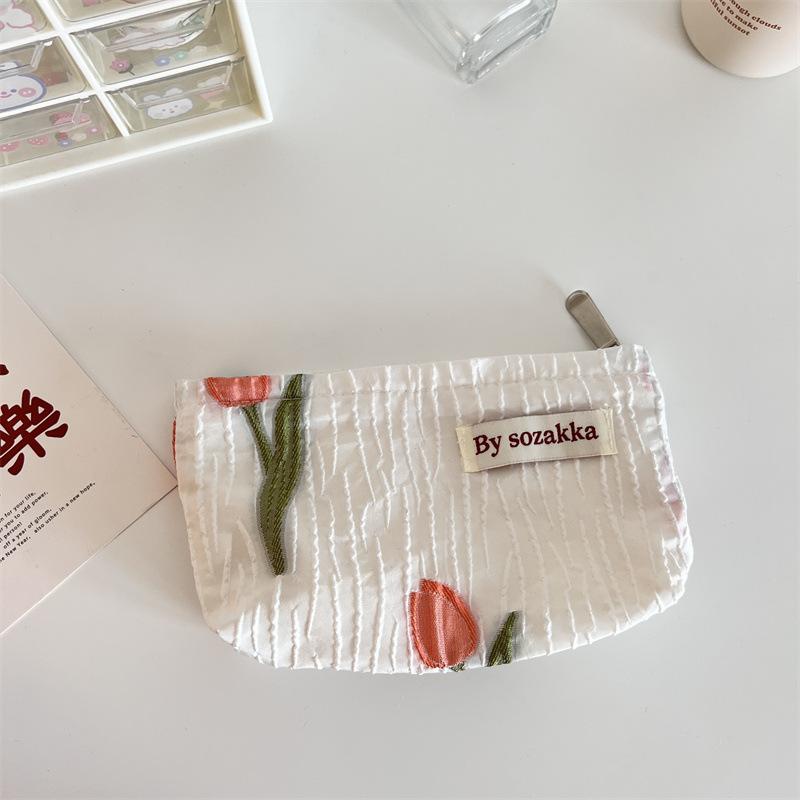 Trendy Ladies Simple And Portable Floral Embossed Cosmetic Bag For Use Everyday