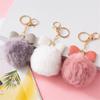 Modny breloczek z pomponem Kreatywny brelok do kluczy z PU w kształcie kokardy z błyszczącymi cyrkoniami Ozdoby do damskiej torebki Akcesoria do uchwytu na klucze samochodowe