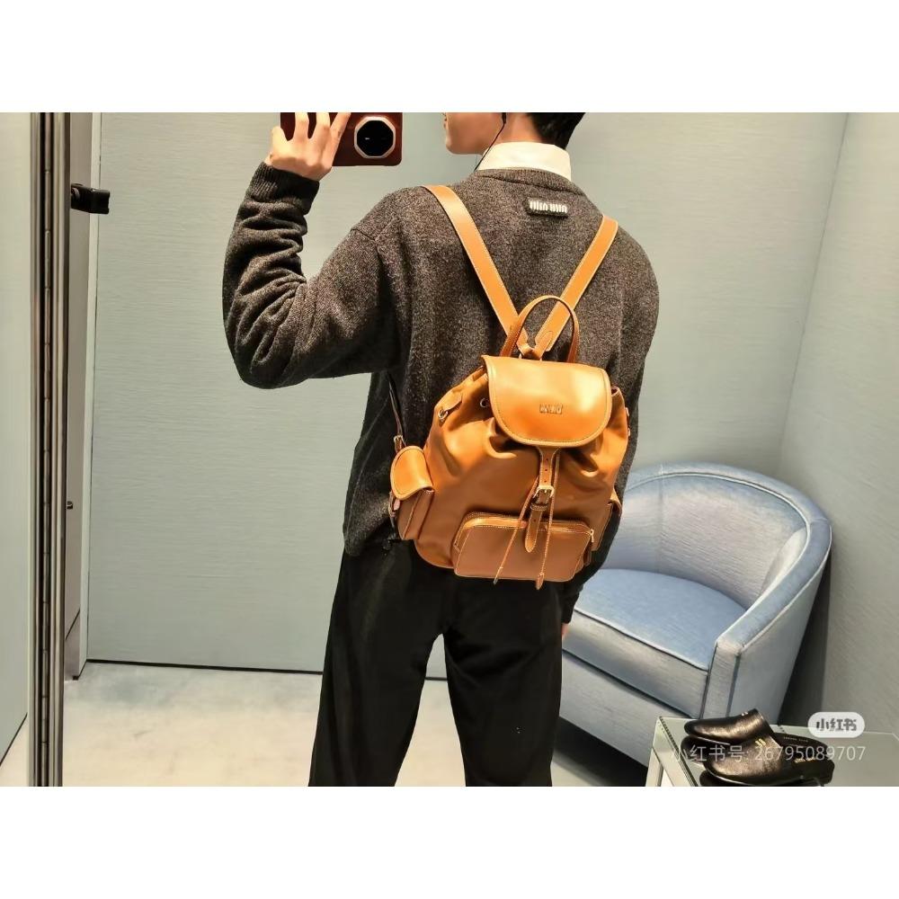 Nový Miao miu 2025 plátěný batoh velkokapacitní prémiový pocit všestranný přenosný ramenní cestovní dojížděcí batoh