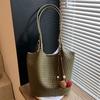 Autumn new texture braided pattern commuting simple large capacity retro solid color bucket armpit shoulder bag for women