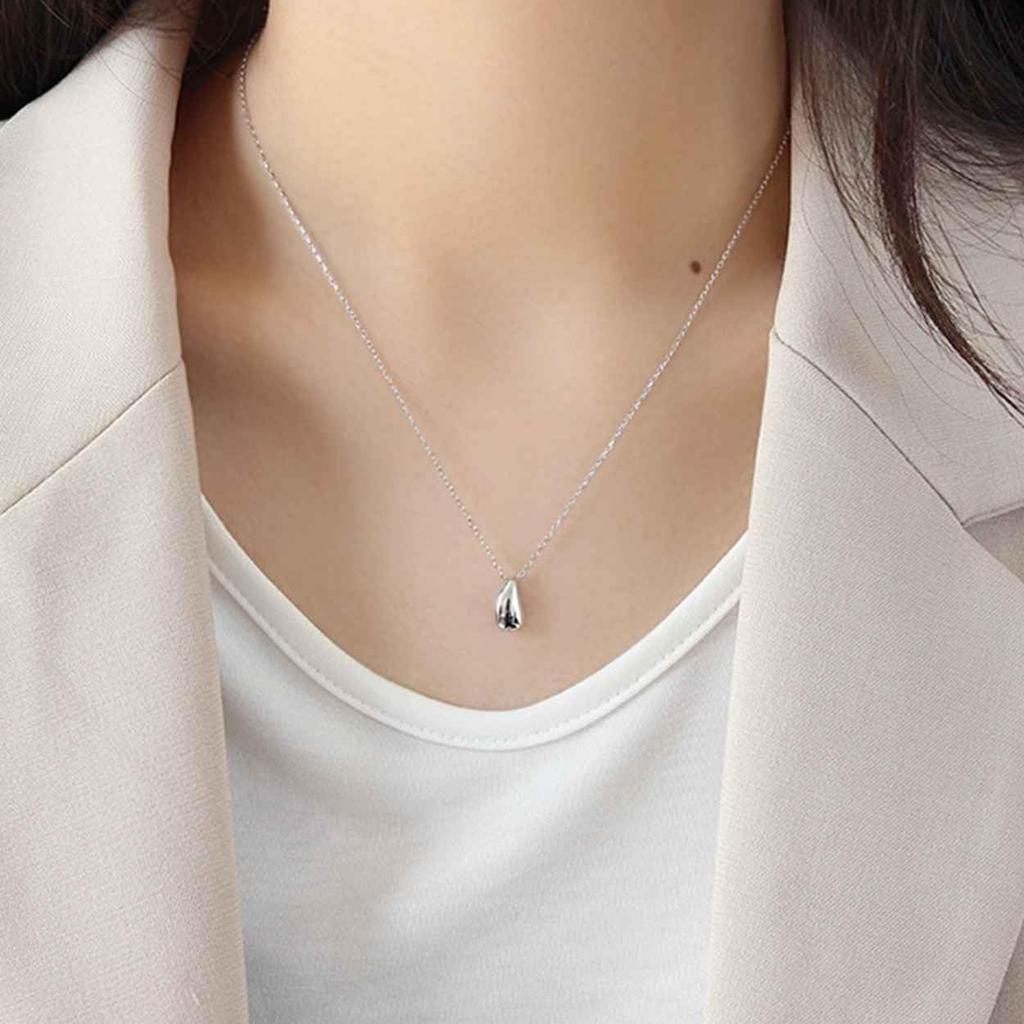 This Genuine 925 Sterling Silver 18K Teardrop Charm Necklace Features a Minimalist Design and a Small It Comes with a Drawstring Pouch and Is a