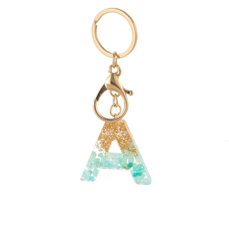 

Ключница из смолы с золотой фольгой и зеленым камнем, подвеска в виде 26 английских букв, классическая, ретро, прочная, аксессуар для сумки, практичный подвес для рюкзака A