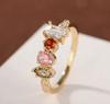 Gold Tone Ring with Multi Shape Gemstones Including Rectangular Oval Round and Marquise Cut Adjustable Band for Women Jewelry