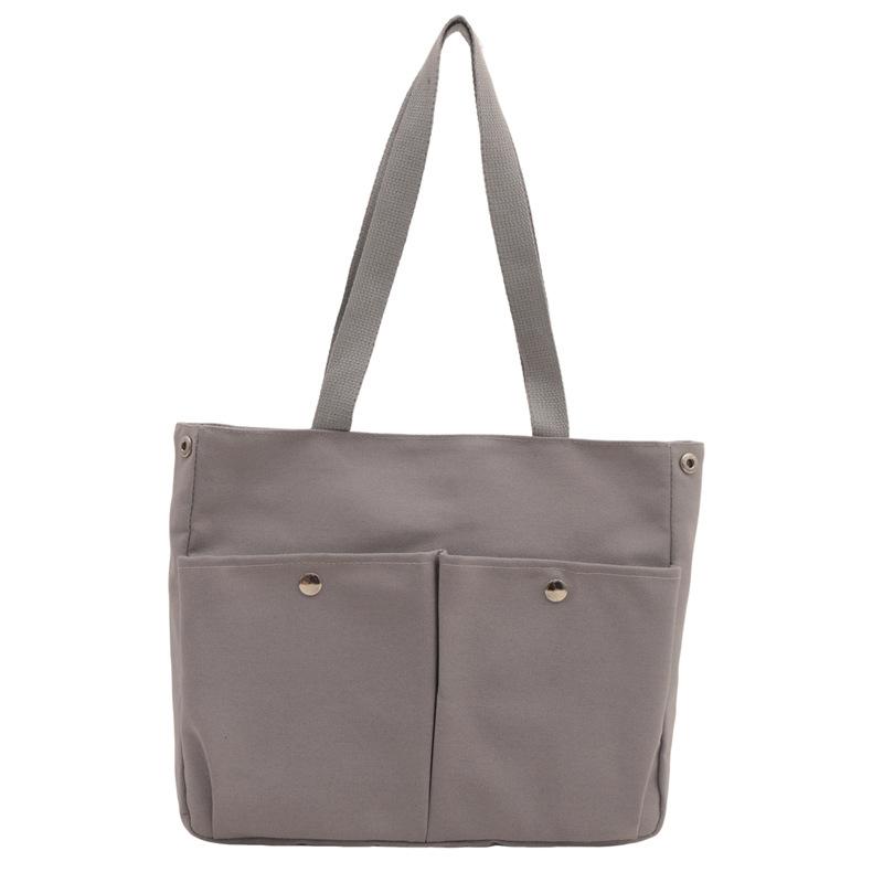 

Lazy wind large-capacity large bag women s 2024 new simple casual canvas bag versatile shoulder commuter tote bag сірий колір